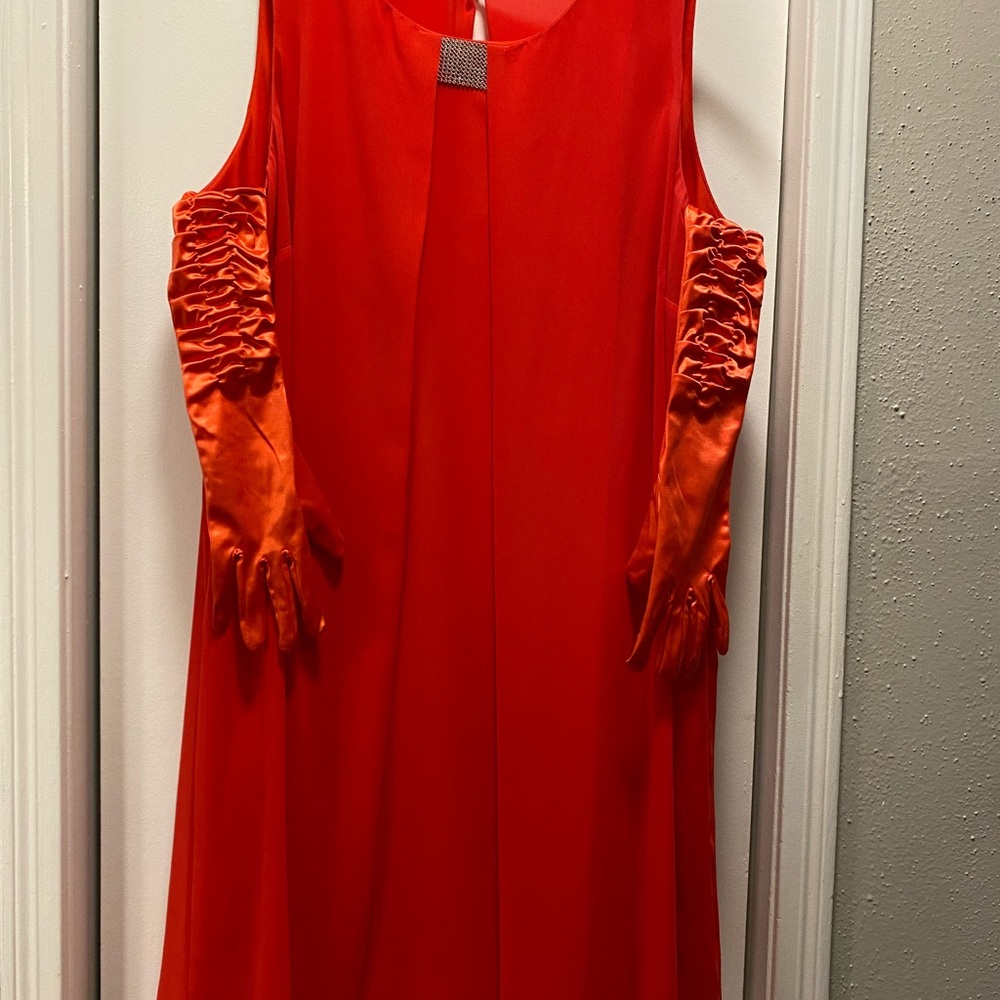 Red dress Woman collection. Top and the lining is 100% polyester & look chiffon.